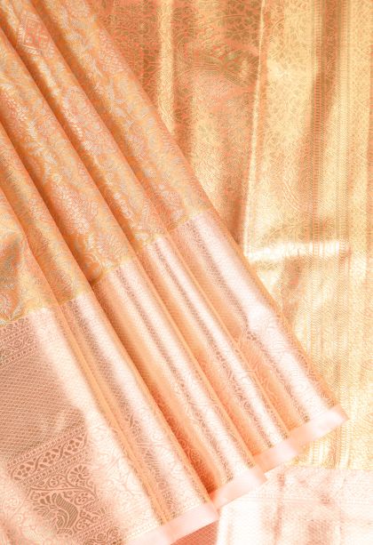 Cantaloupe Orange Apoorva Silk Sarees with Gold And Silver Zari Floral Patterns