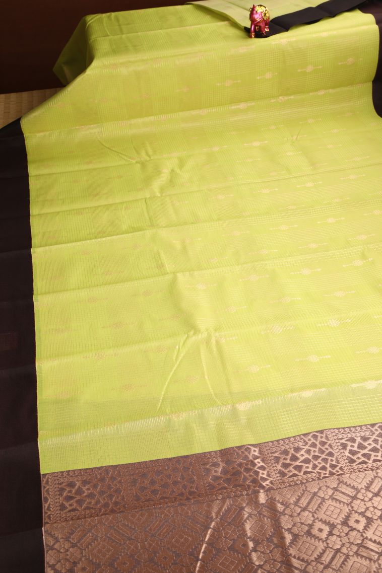 Lime Yellow Silk Cotton Sarees with Copper Zari Straipes And Puttas view 2