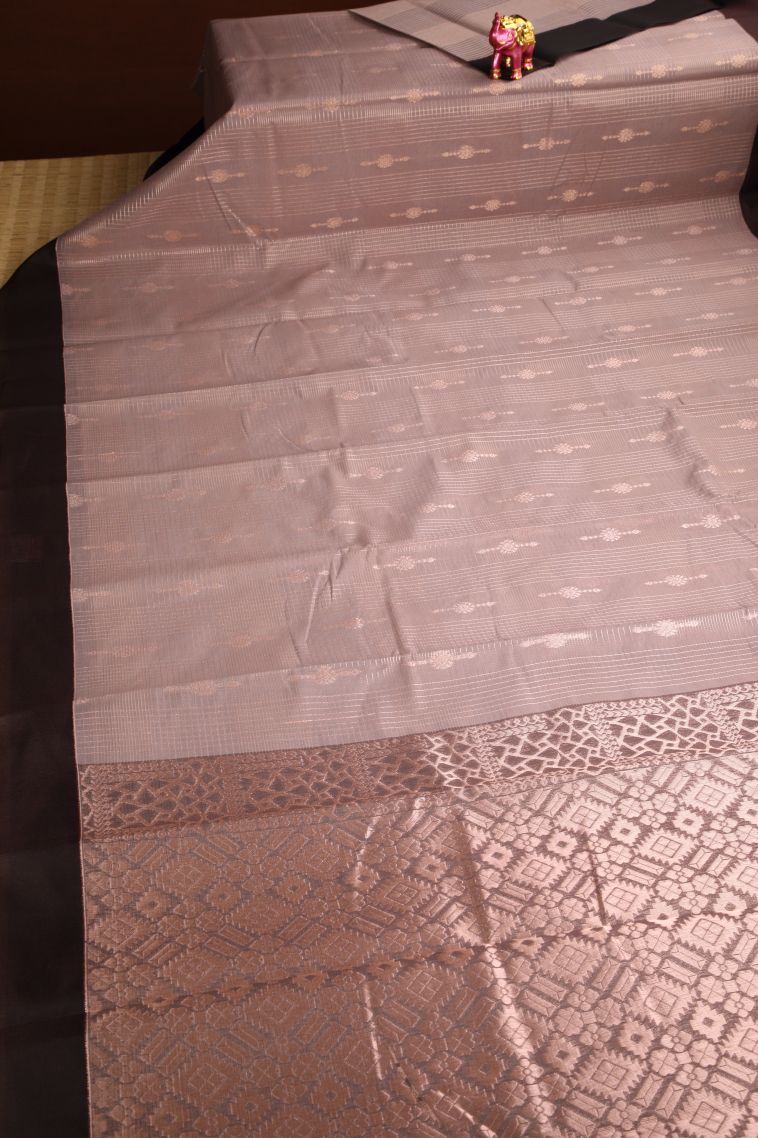 Salmon Pink Silk Cotton Sarees with Copper Zari Straipes And Puttas view 2