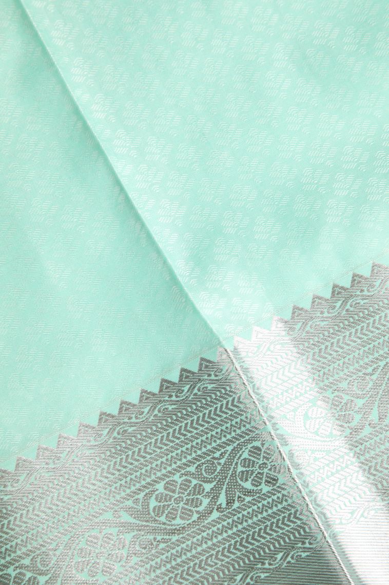 Pistachio Green Visiri Madippu Silk Sarees with Silver Zari Floral Puttas view 3