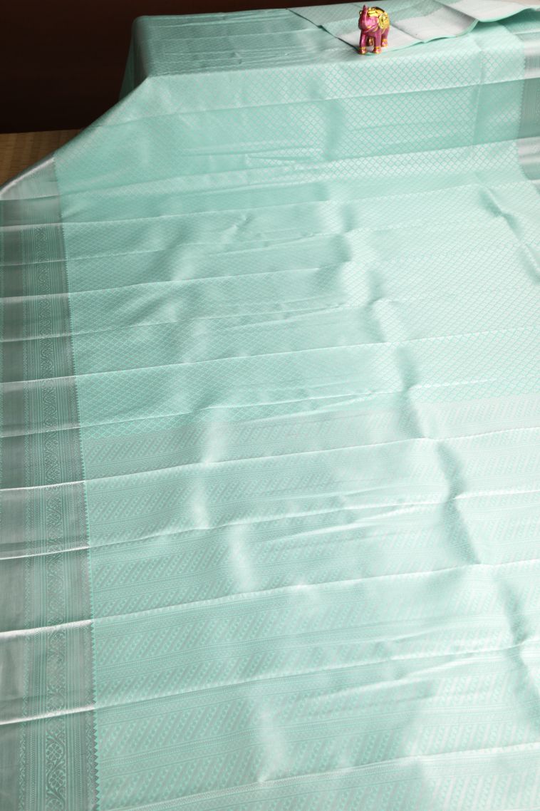 Pistachio Green Visiri Madippu Silk Sarees with Silver Zari Floral Puttas view 2