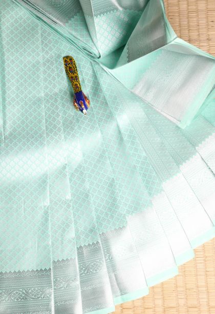Pistachio Green Visiri Madippu Silk Sarees with Silver Zari Floral Puttas