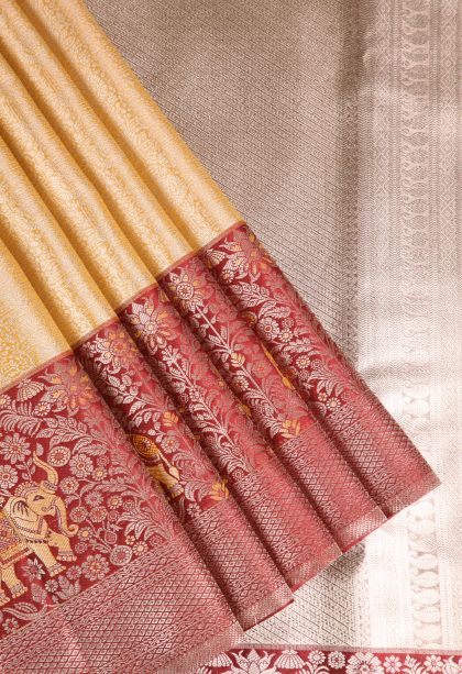 Merigold Orange Apoorva Silk Sarees with Silver Zari Floral Puttas