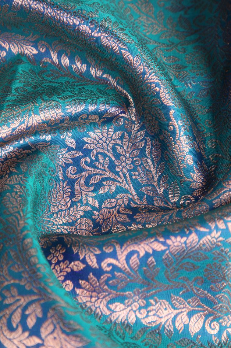 Teal Blue Kanchipuram Silk Sarees with Copper Zari Floral Patterns view 4