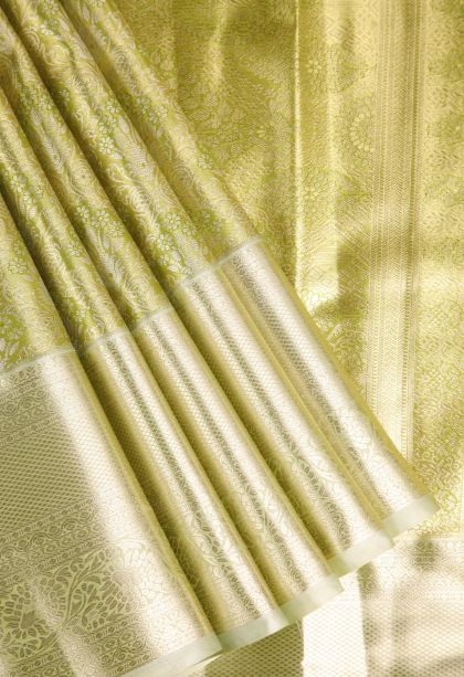 Olive Green Apoorva Silk Sarees with Gold And Silver Zari Floral Patterns
