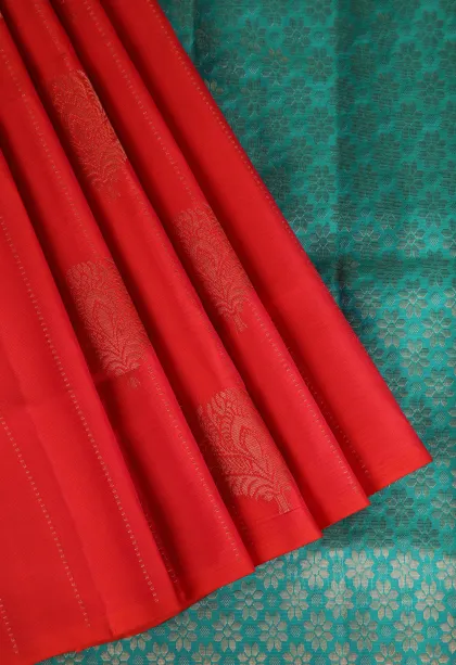 Rose Red Soft Silk Saree with Copper Zari Straipes And Puttas