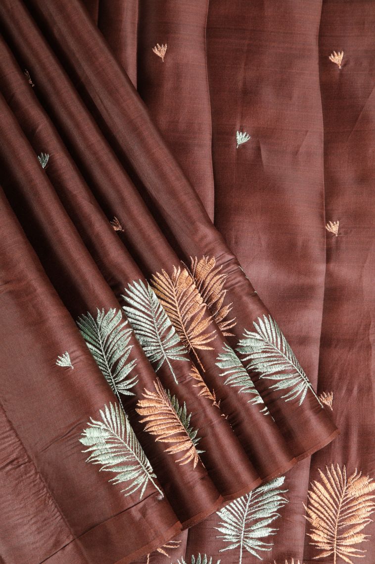 Cinnamon Brown Raw Silk Sarees Without Zari with Floral Puttas Embroidary view 1