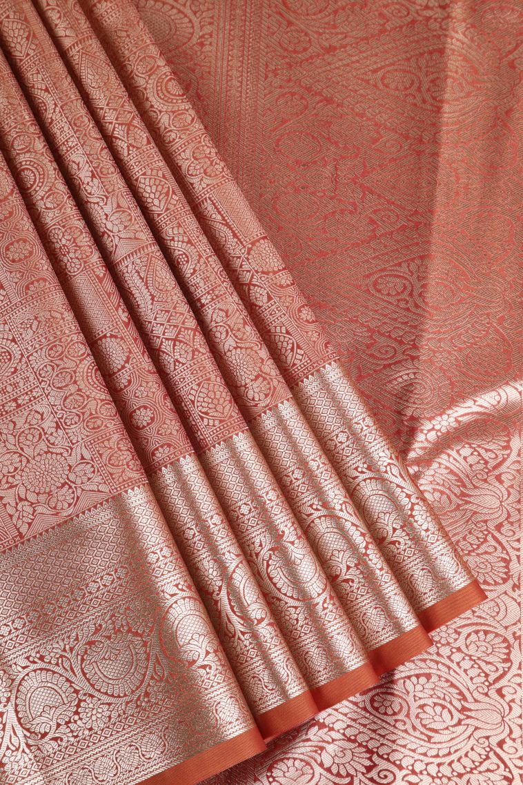 Rust Orange Apoorva Silk Sarees with Copper Zari Floral Puttas