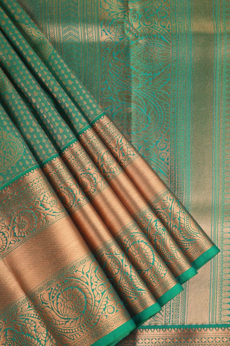 Basil Green Apoorva Silk Sarees with Copper Zari Floral Puttas