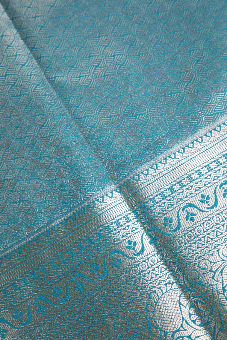 Cerulean Blue Apoorva Silk Sarees with Copper Zari Floral Puttas view 3