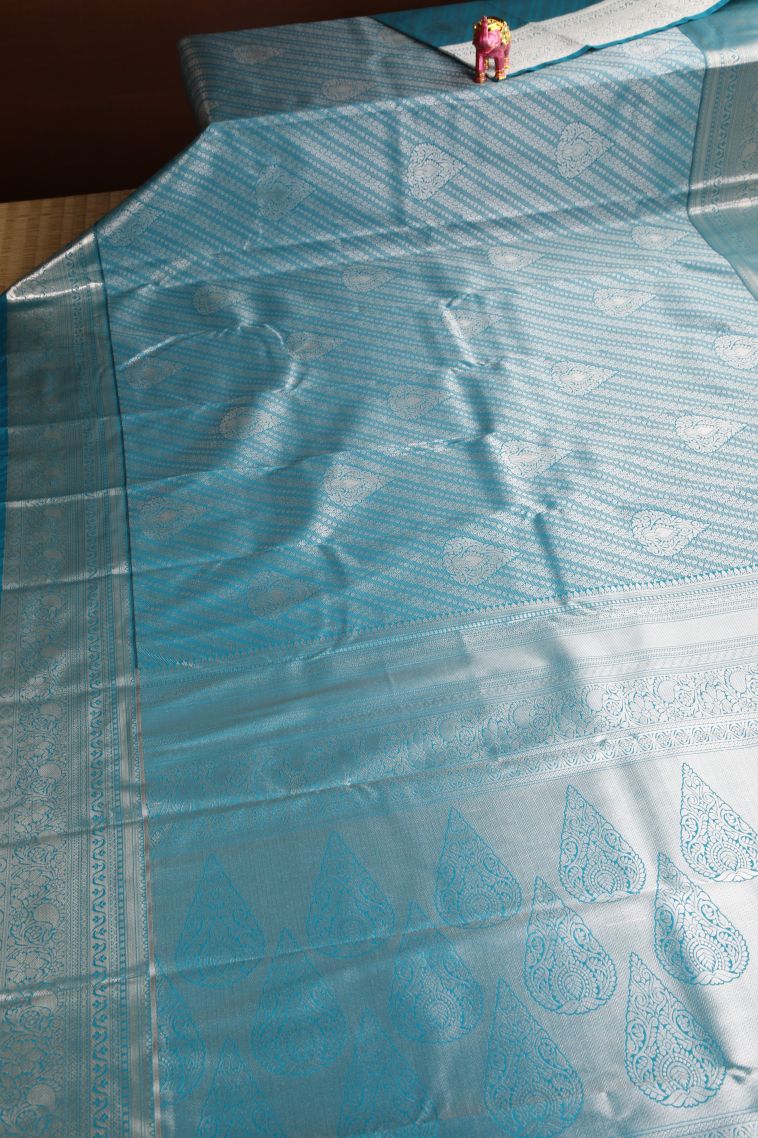 Cerulean Blue Apoorva Silk Sarees with Copper Zari Floral Puttas view 2