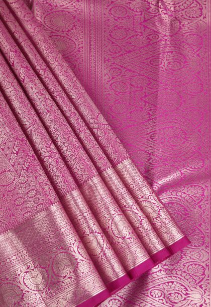 Fuscia Pink Apoorva Silk Sarees with Copper Zari Floral Puttas