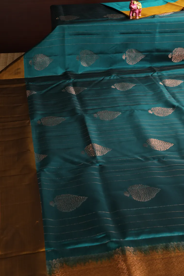 Ocean Blue Soft Silk Saree with Copper Zari Straipes And Puttas view 2