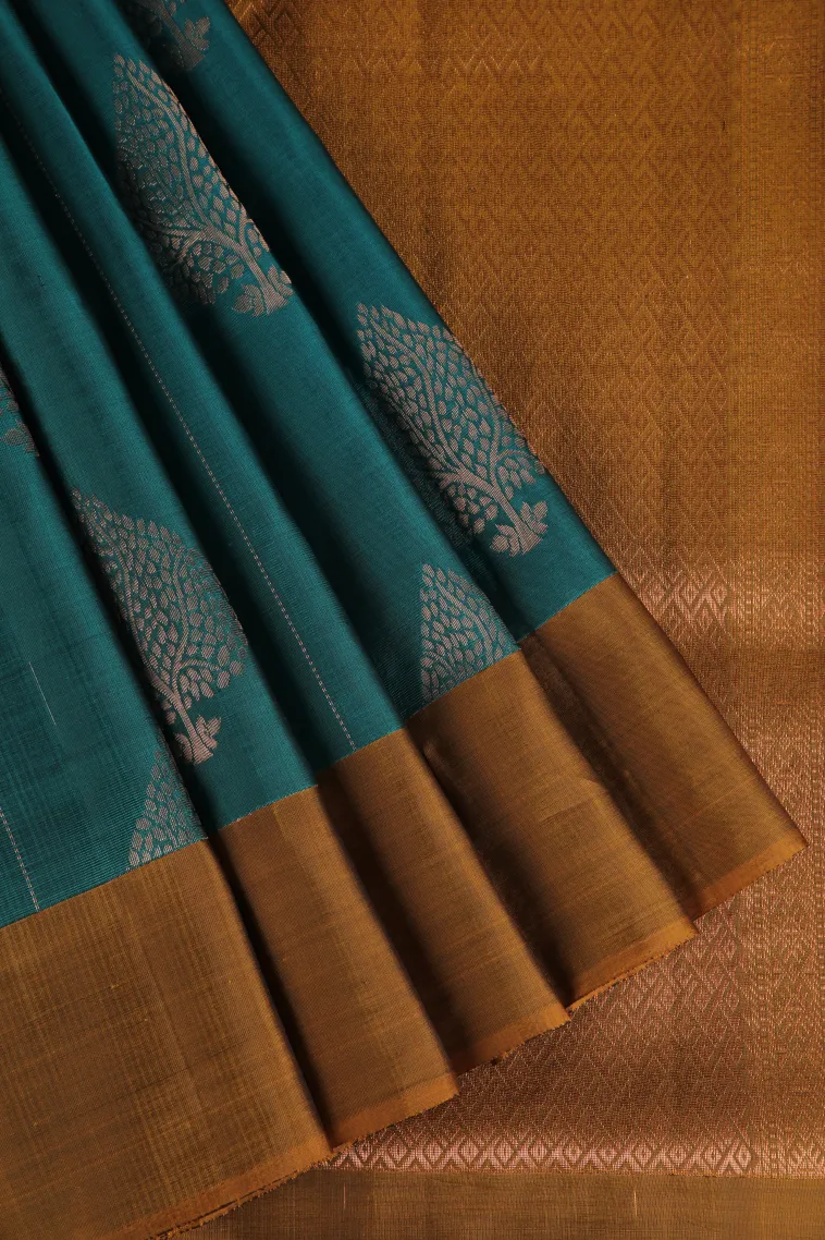 Ocean Blue Soft Silk Saree with Copper Zari Straipes And Puttas