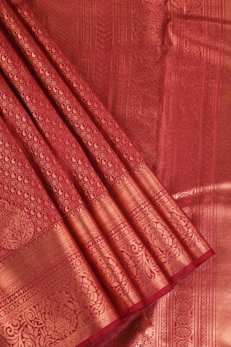 Apple Red Apoorva Silk Sarees Copper Zari with Floral Puttas