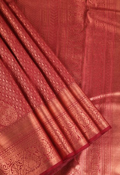 Apple Red Apoorva Silk Sarees Copper Zari with Floral Puttas