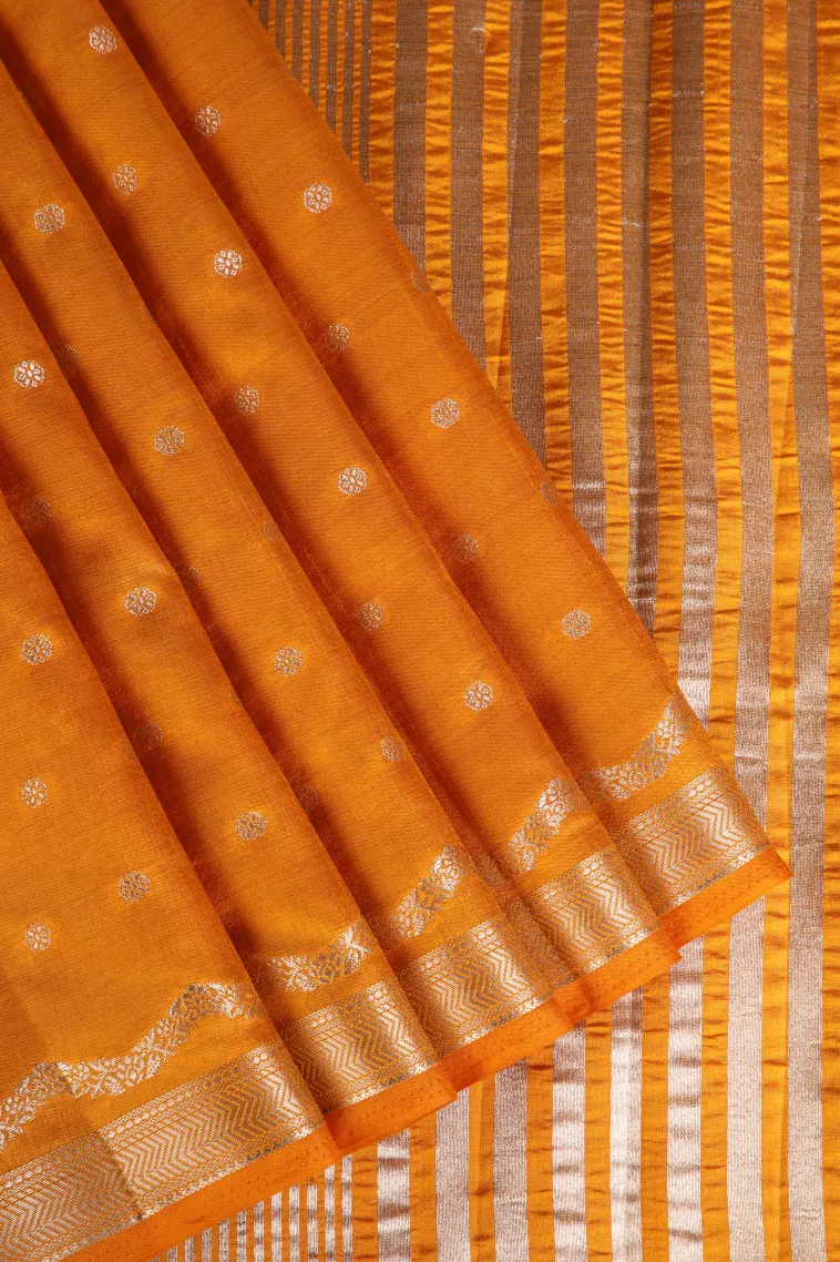Lemon Yellow Raw Silk Sarees with Antic Zari Puttas