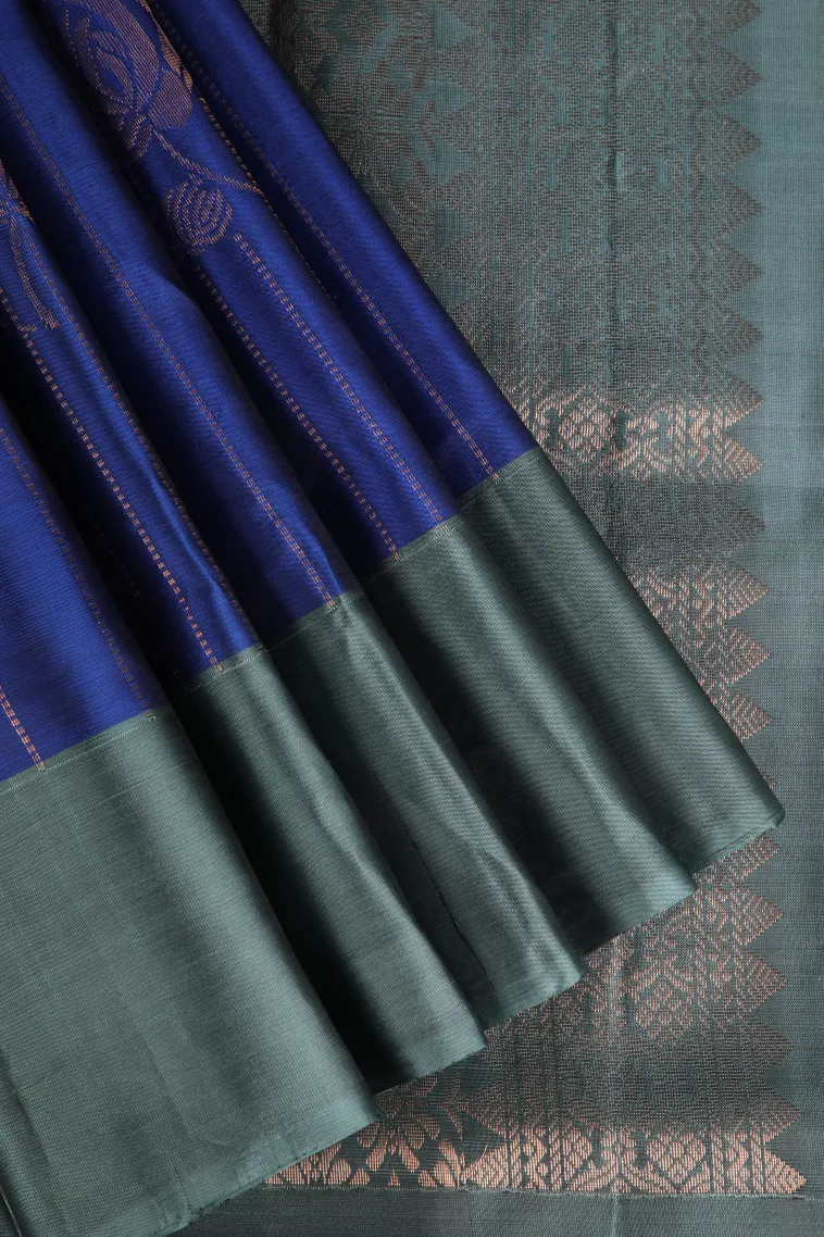 Azure Blue Soft Silk Saree with Copper Zari Straipes And Puttas