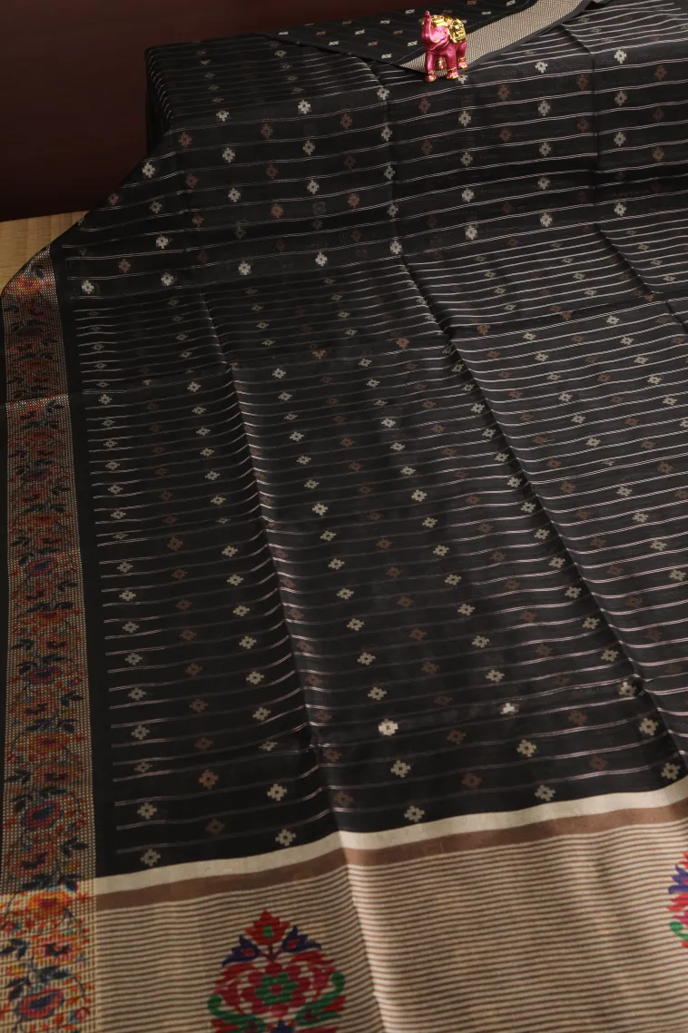 Asphalt Black Raw Silk Sarees with Gold And Silver Zari Straipes And Puttas view 2