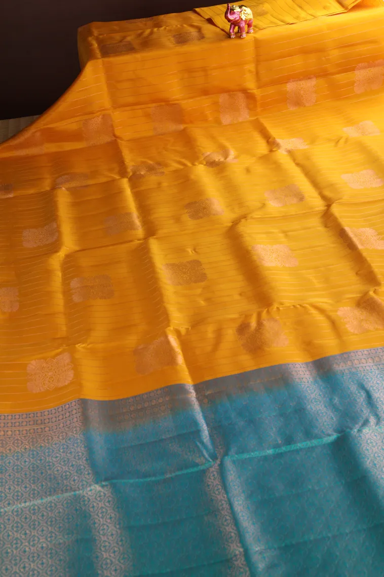 Lemon Yellow Soft Silk Saree with Copper Zari Straipes And Puttas view 2