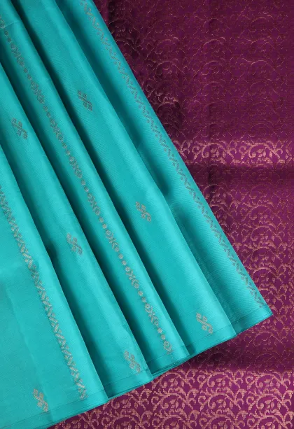 Arctic Blue Soft Silk Saree with Copper Zari Straipes And Puttas
