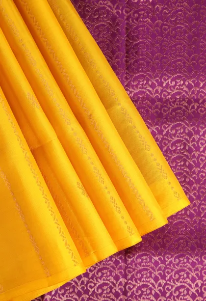 Lemon Yellow Soft Silk Saree with Copper Zari Straipes And Puttas