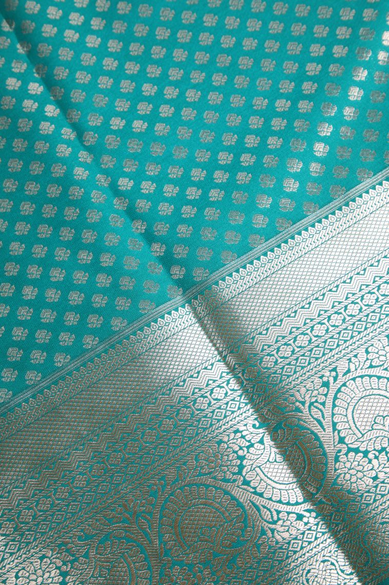Sapphire Blue Apoorva Silk Sarees with Copper Zari Floral Puttas view 3