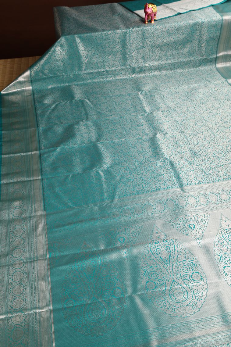 Sapphire Blue Apoorva Silk Sarees with Copper Zari Floral Puttas view 2