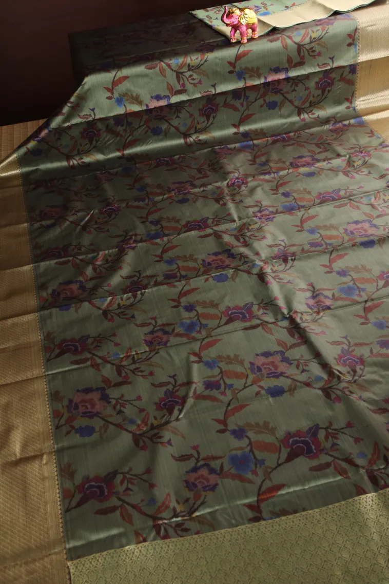 Pistachio Green Soft Silk Sarees with Bronze Zari Floral Patterns view 2