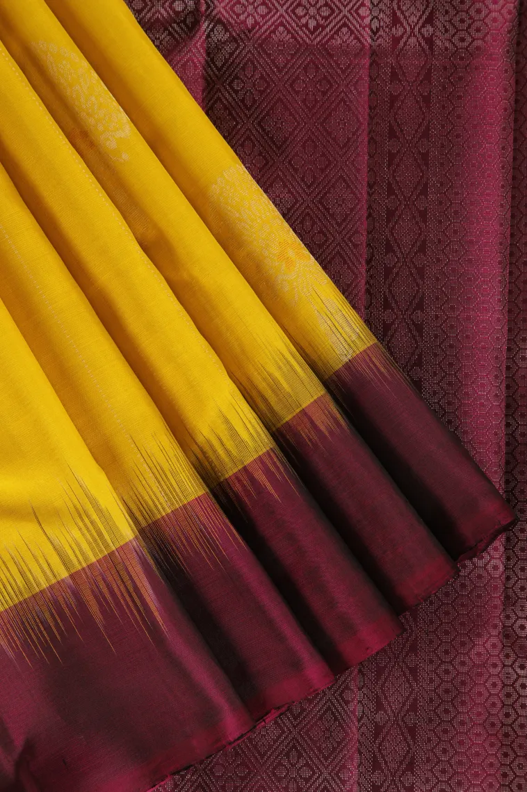 Lemon Yellow Soft Silk Saree with Copper And Silver Zari Flower Mottif