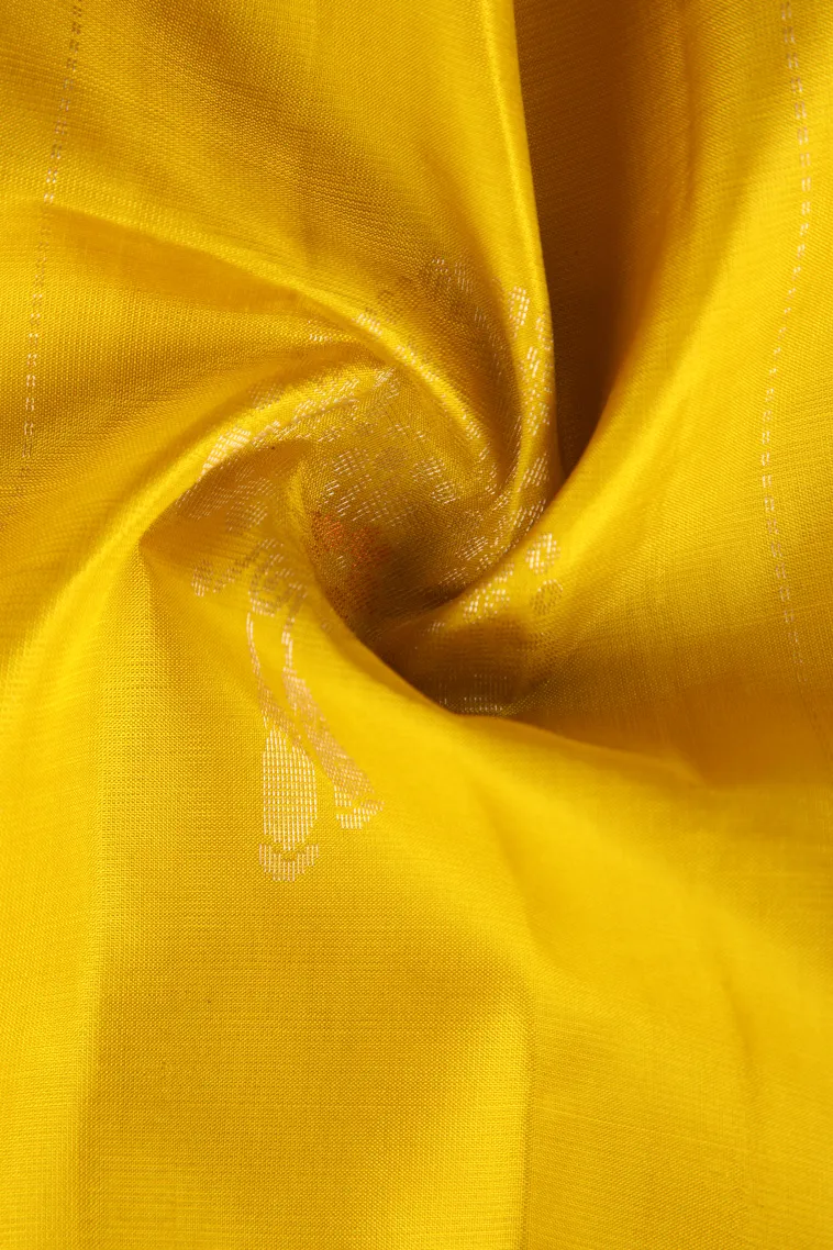 Lemon Yellow Soft Silk Saree with Copper And Silver Zari Flower Mottif view 4