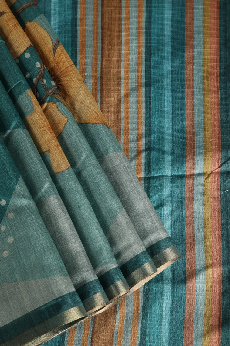 Teal Blue Raw Silk Sarees Without Zari With Floral Patterns