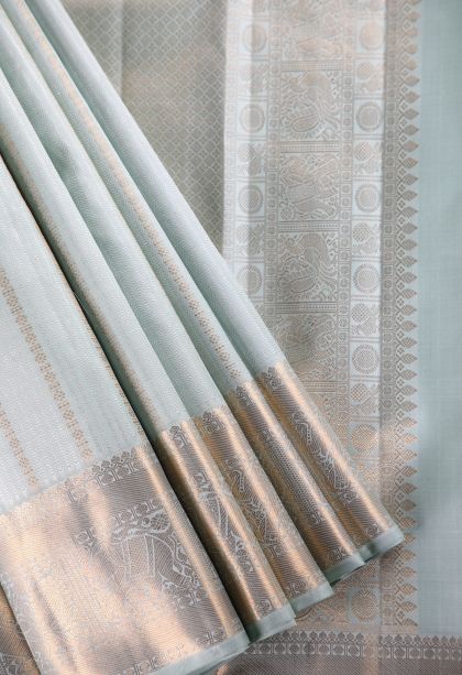 Sky Blue Kanchipuram Silk Sarees with Gold Zari Stripes