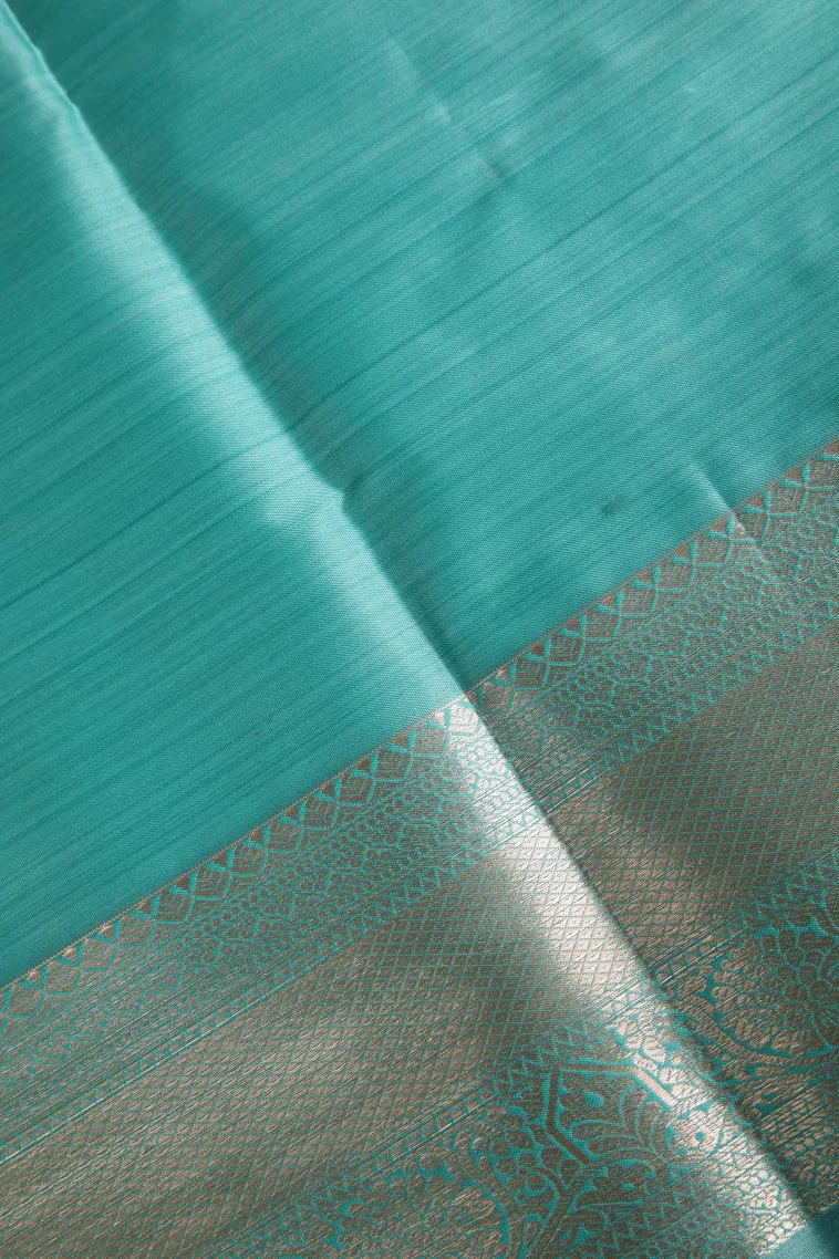 Sapphire Blue Soft Silk Sarees with Bronze Zari Floral Patterns view 3