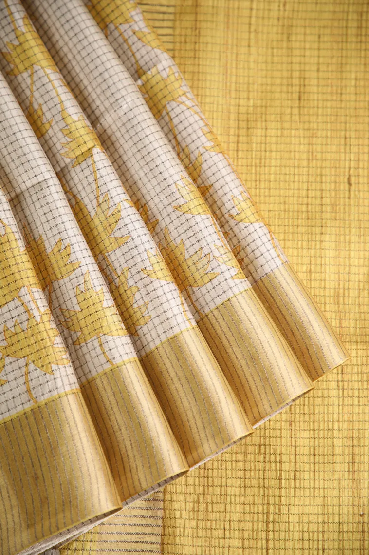 Merigold Orange Jute Sarees with Gold Zari Floral Patterns