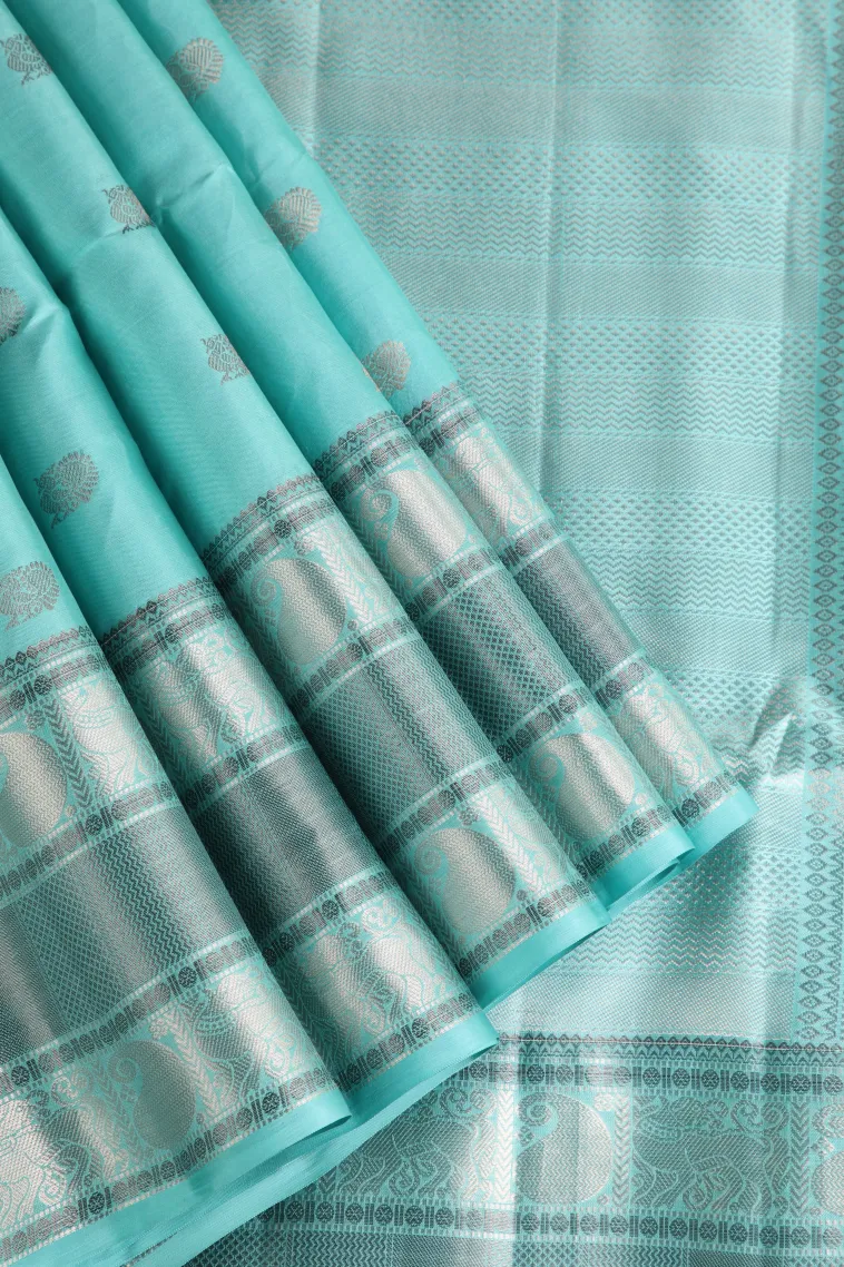 Arctic Blue Soft Silk Saree with Silver Zari Peacock Motifs