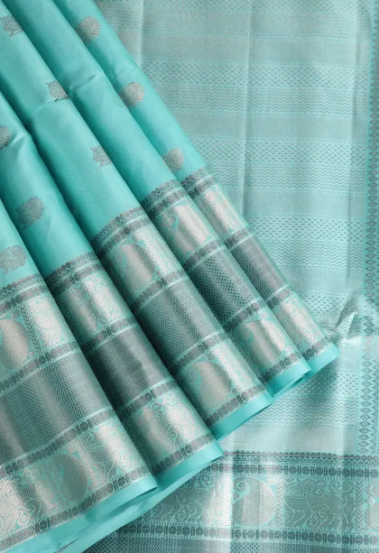 Arctic Blue Soft Silk Saree with Silver Zari Peacock Motifs