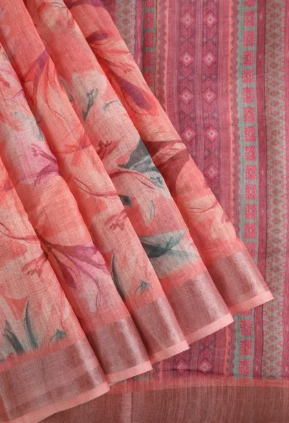 Salmon Pink Linen Saree with Silver Zari Floral Patterns