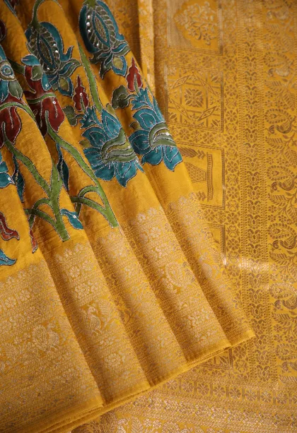 Merigold Orange Banaras Sarees with Gold Zari Floral Patterns