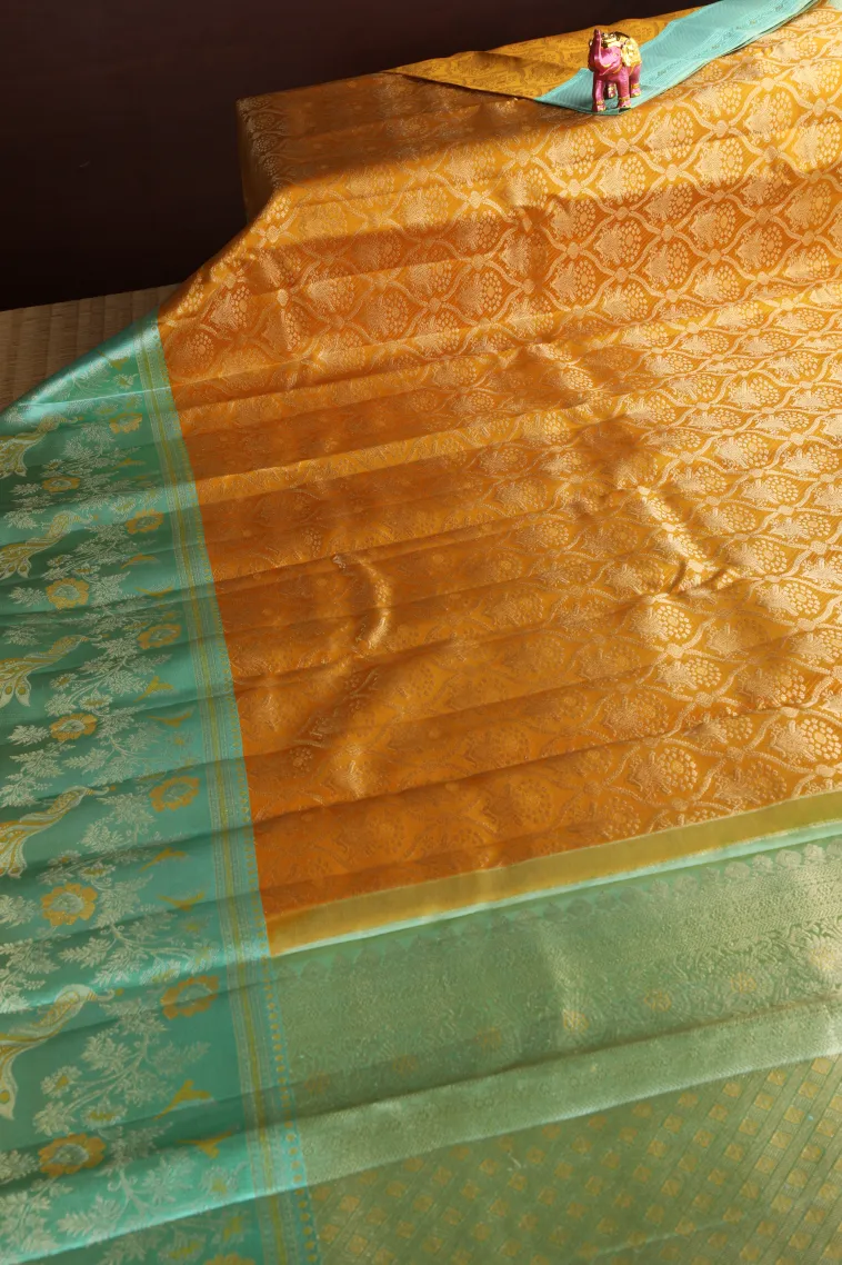 Gold Kanchipuram Silk Sarees with Gold And Silver Zari Floral Patterns view 2