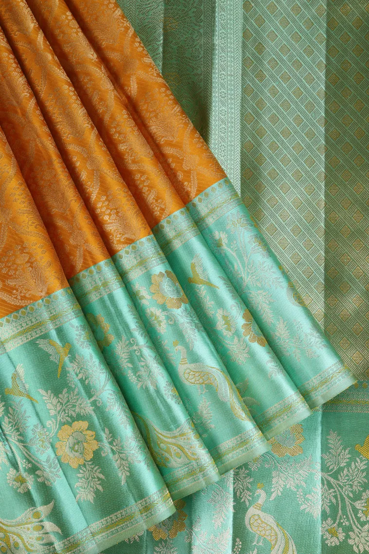Gold Kanchipuram Silk Sarees with Gold And Silver Zari Floral Patterns