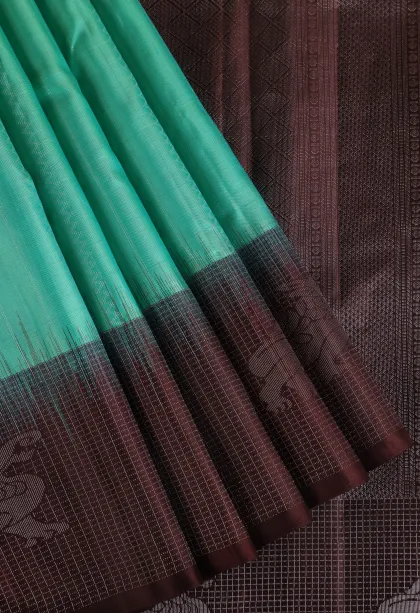 Teal Blue Soft Silk Saree with Silver Zari Straipes And Puttas
