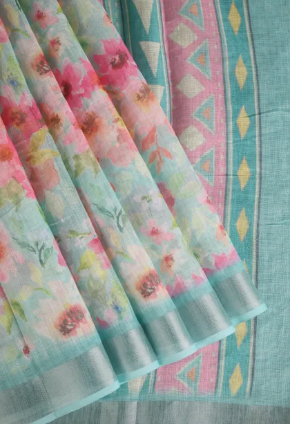 Sky Blue Linen Saree with Silver Zari Floral Patterns