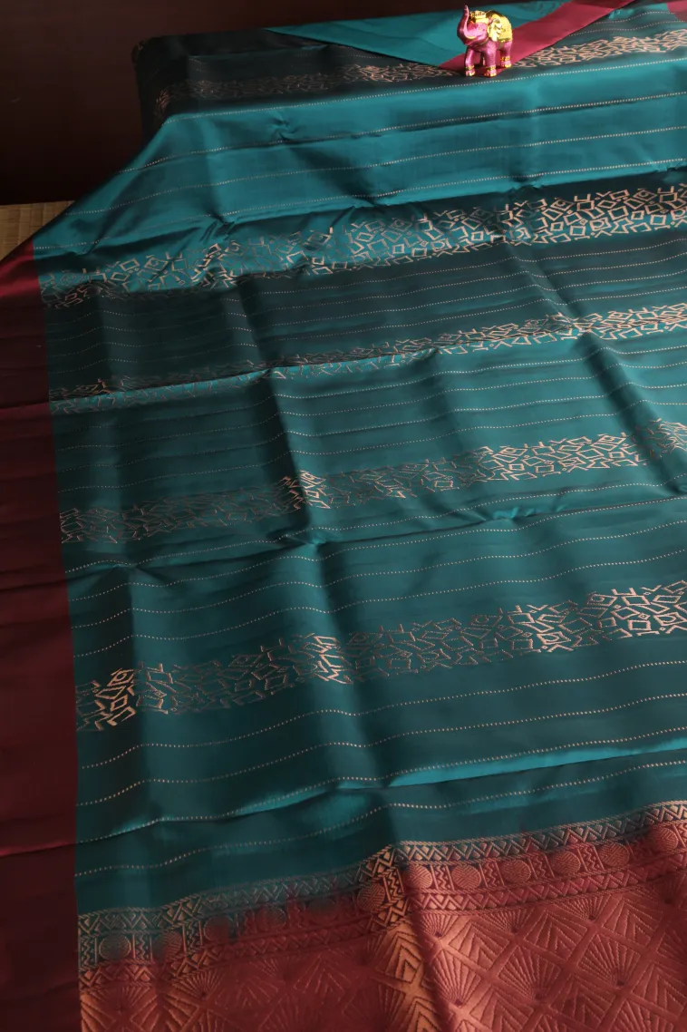 Ocean Blue Soft Silk Saree with Copper Zari Straipes And Puttas view 2