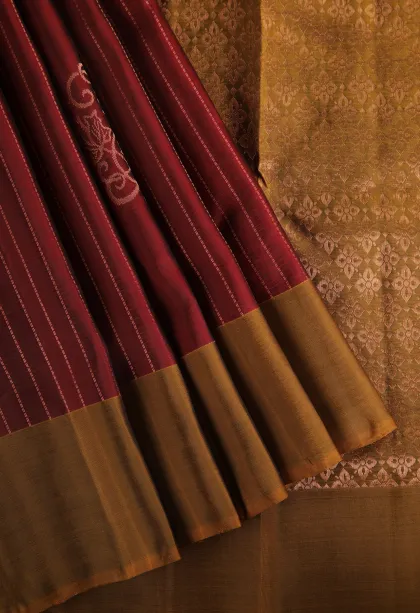 Berry Red Soft Silk Saree with Copper Zari Straipes And Puttas