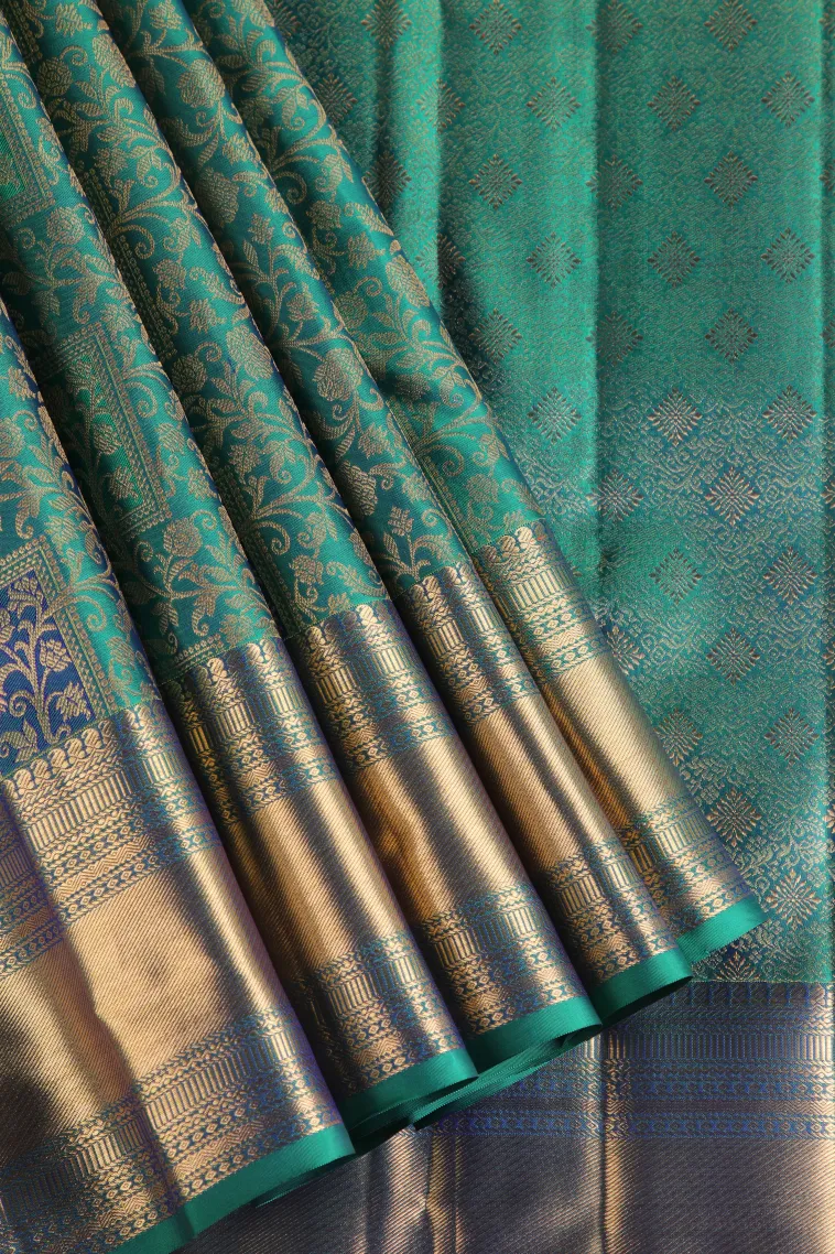 Teal Blue Kanchipuram Silk Sarees with Gold Zari Floral Patterns
