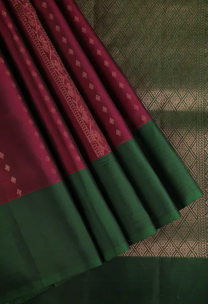 Magenta Purple Soft Silk Saree with Copper Zari Straipes And Puttas