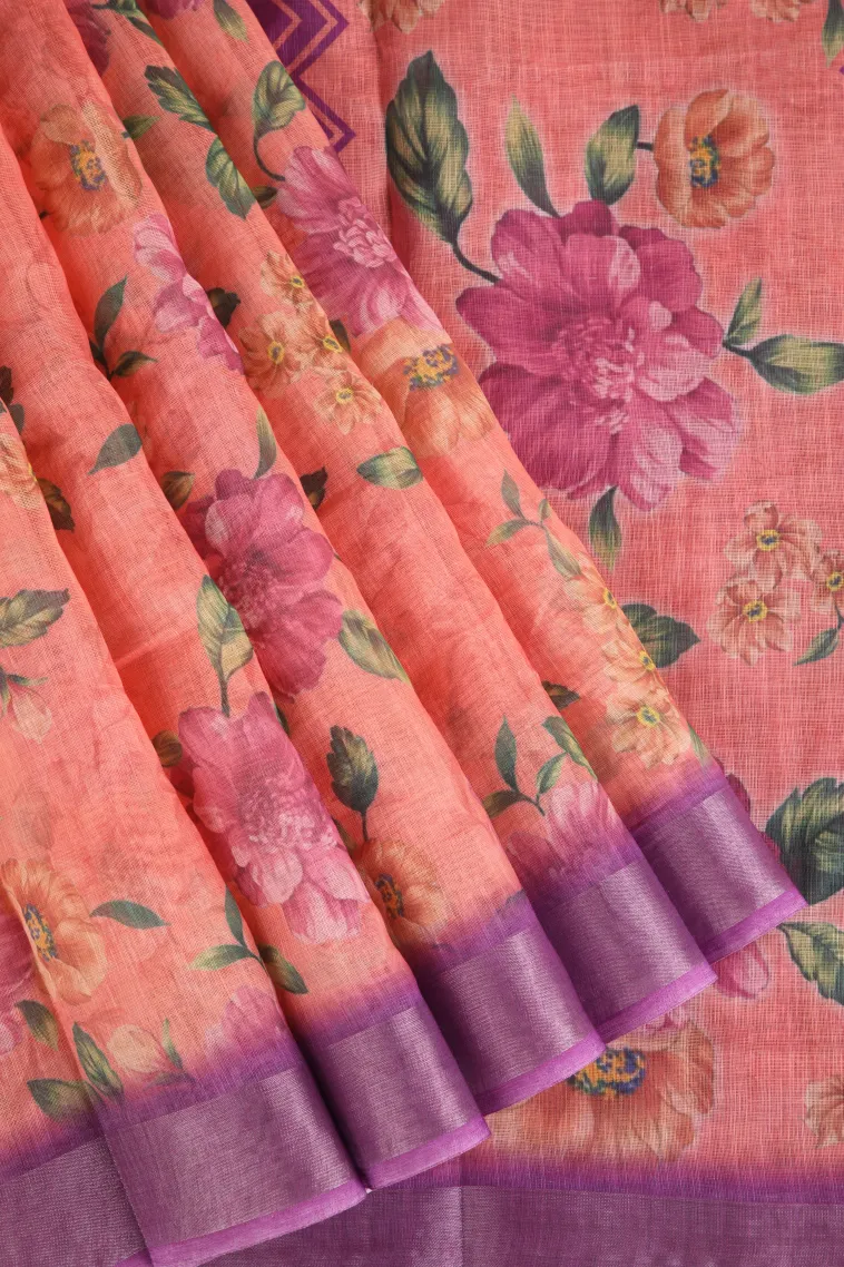 Salmon Pink Linen Saree with Silver Zari Floral Patterns