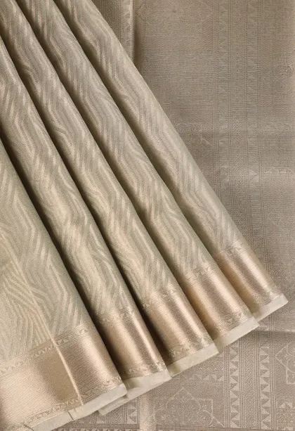 Pistachio Green Organza Saree with Bronze Zari Floral Patterns