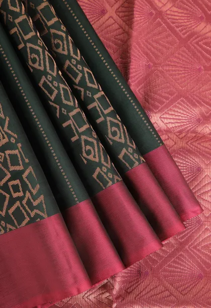 Bottle Green Soft Silk Saree with Copper Zari Straipes And Puttas